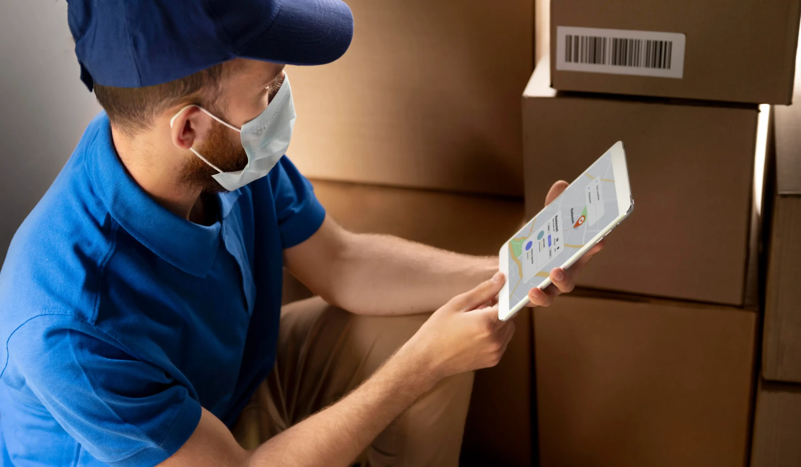 Man using technology to pick and pack the orders