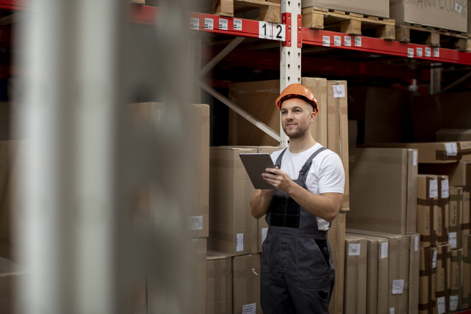 a warehouse manager checking on the inventory health